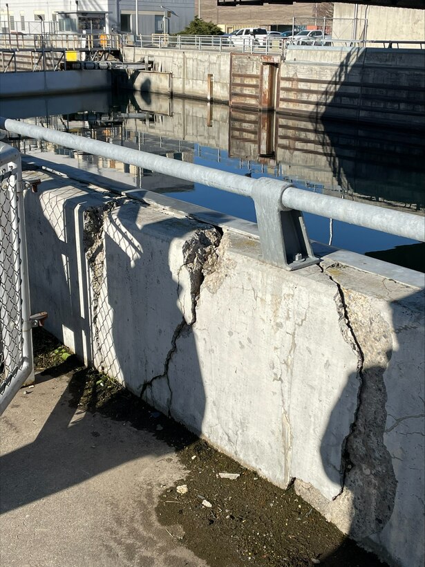 Photo of concrete damage at the parapet wall.