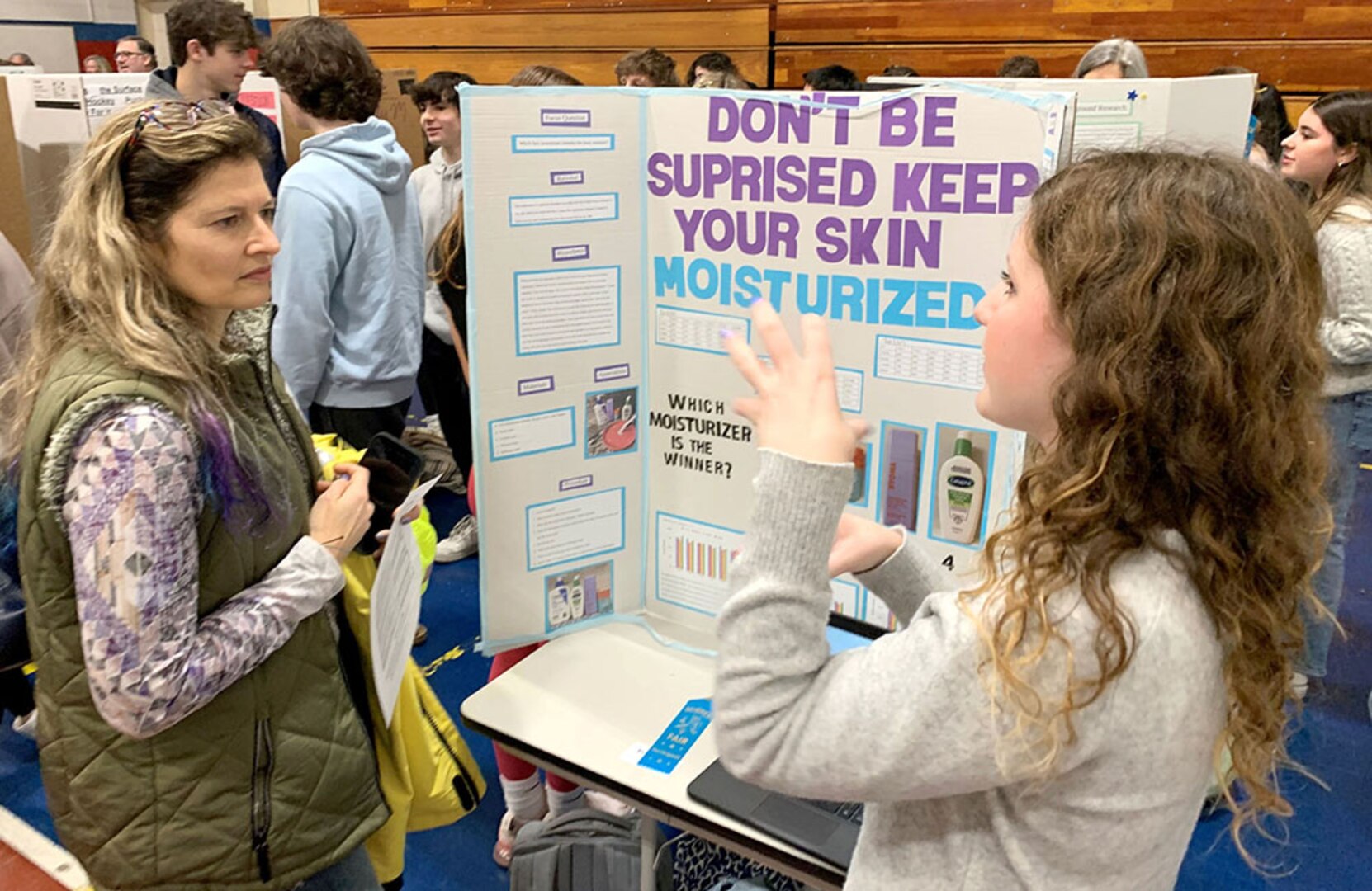 NUWC Division Newport employees guide STEM learning by judging science fairs