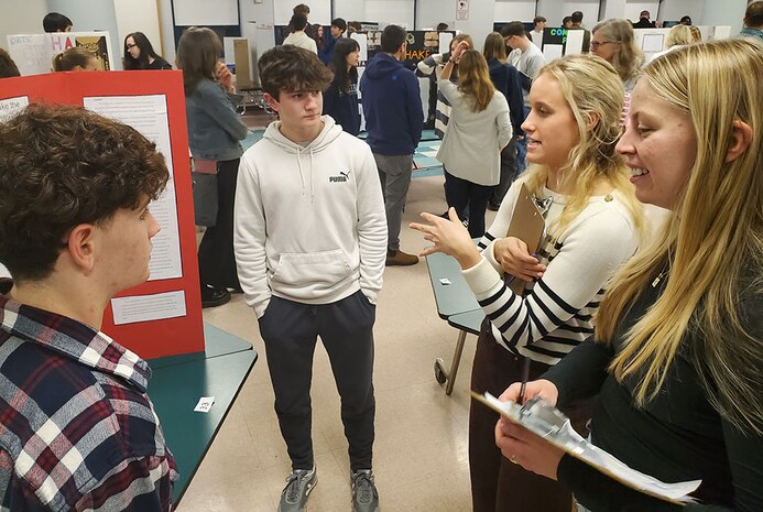 NUWC Division Newport employees guide STEM learning by judging science fairs