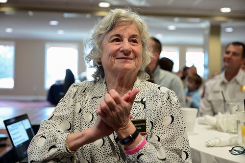 Pam Callan, 17th Training Wing honorary commander, claps during 17th Training Group annual awards ceremony at the San Angelo Country Club, San Angelo, Texas, Jan. 12, 2024. The honorary commanders started their day off with the opportunity to interact and have breakfast with members of the 17th TRG. (U.S. Air Force photo by Airman 1st Class Madison Collier)