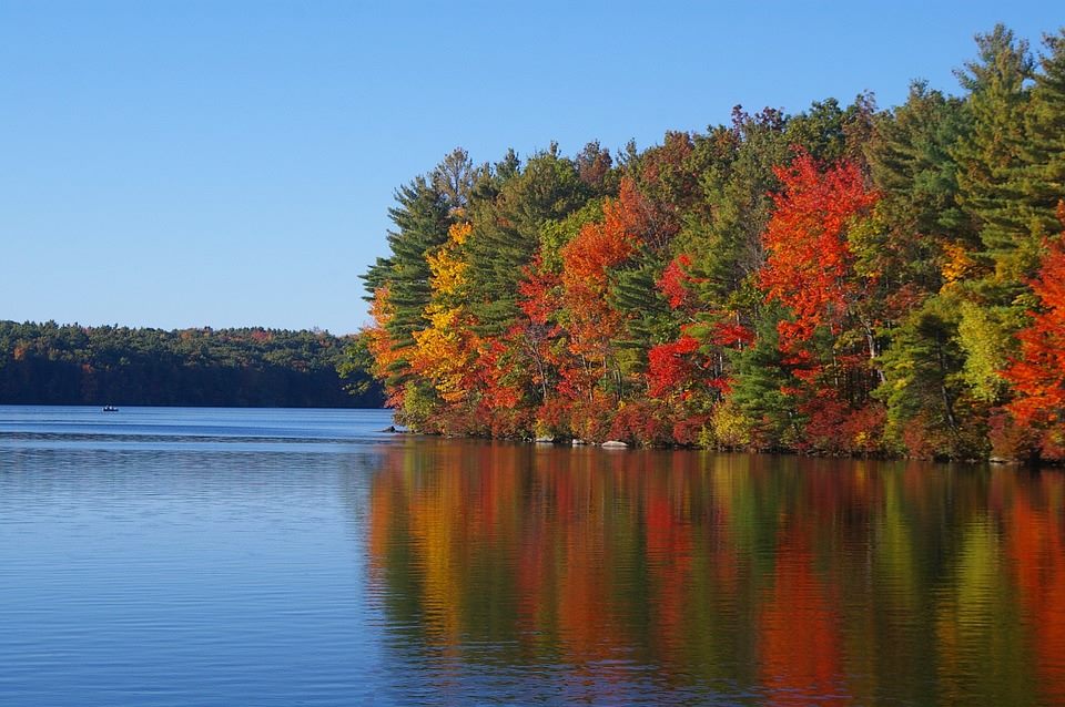 Fall colors on the trees over Brookville Lake in Brookville, Indiana.
