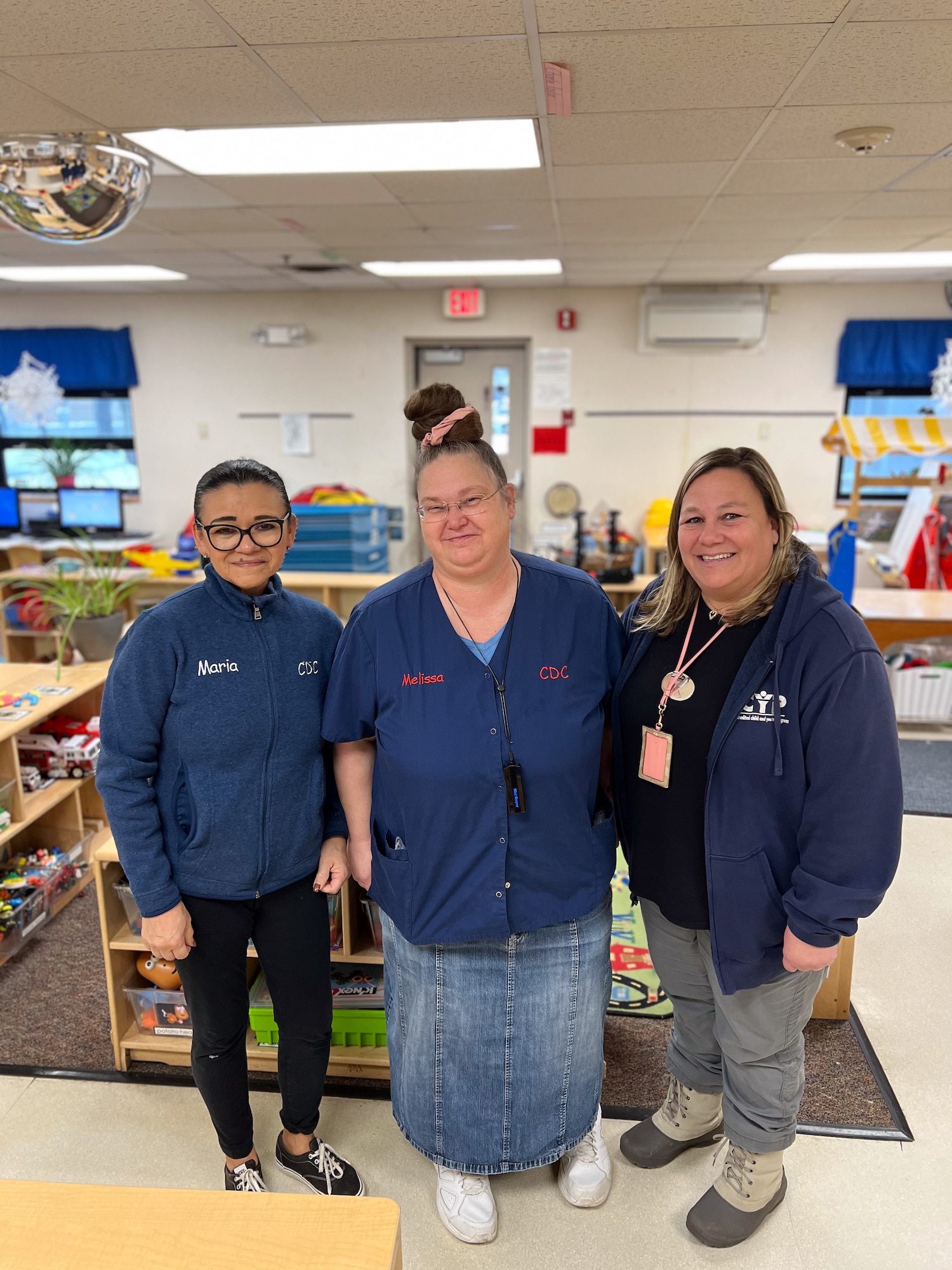 Child Development Center staff pose for a photo at Joint Base McGuire-Dix-Lakehurst, N.J., Jan. 16, 2024. Staff members kept the center open during a winter storm that caused several base closures due to safety concerns, enabling JB MDL essential personnel to continue to execute their mission. (U.S. Air Force photo by Capt. Kitsana Dounglomchan)