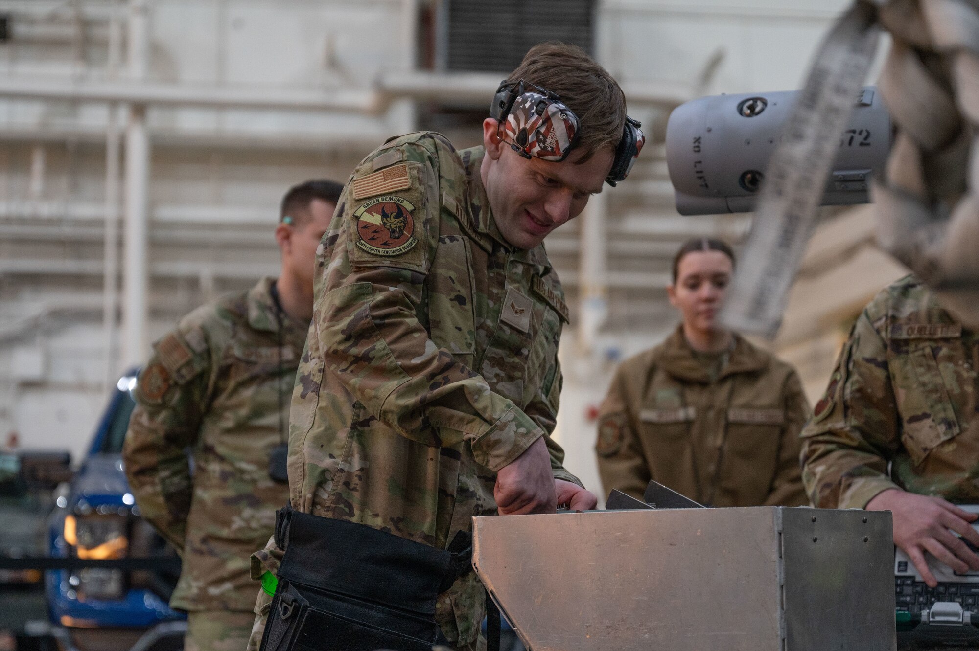 U.S. Air Force Airman 1st Class Joseph Williams, 356th Fighter Generation Squadron load crew apprentice, pulls out equipment during a load competition on Eielson Air Force Base, Alaska, Jan. 11, 2024.