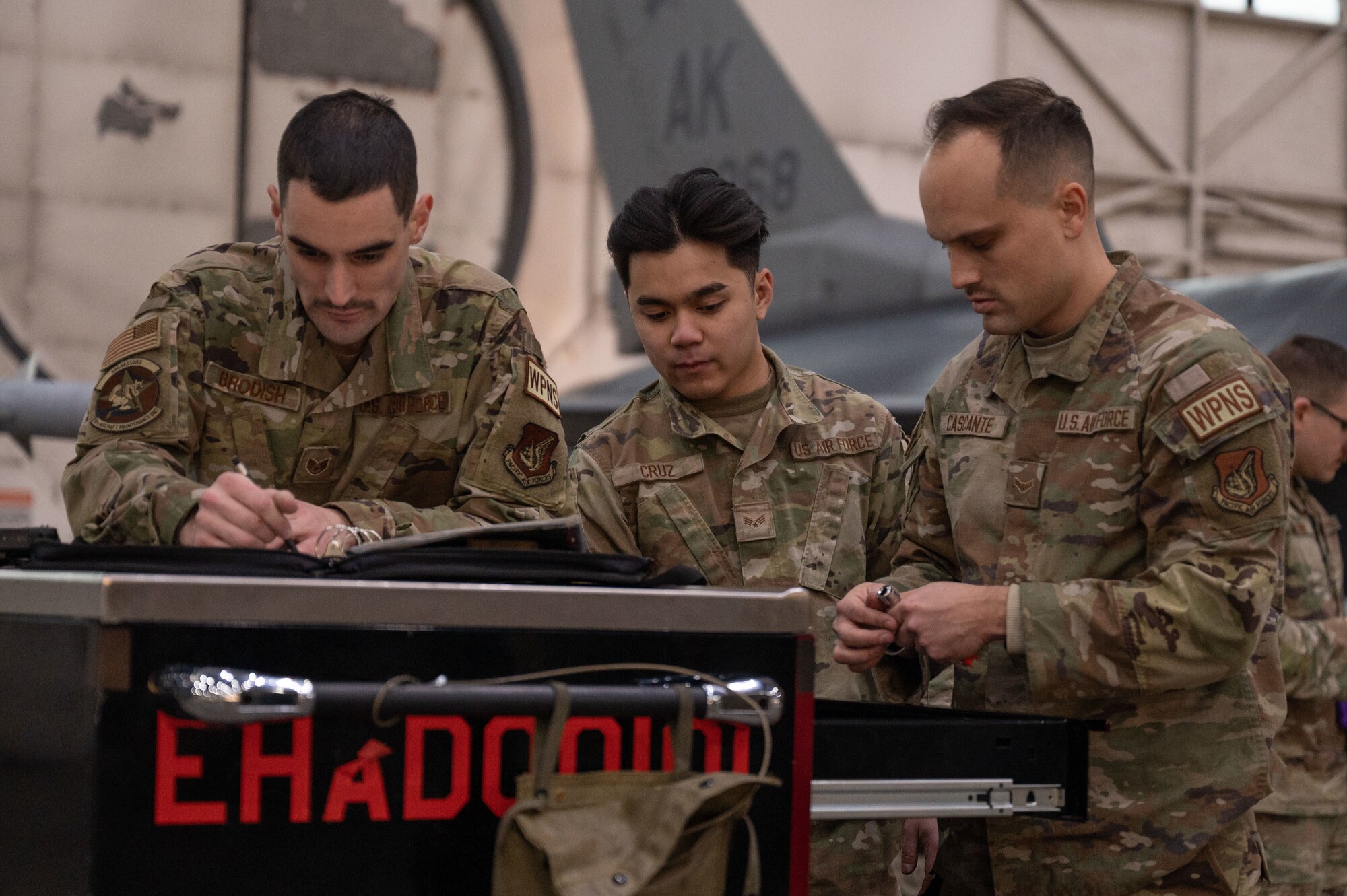 U.S. Air Force Airmen assigned to the 18th Aircraft Maintenance Unit participate in a load competition on Eielson Air Force Base, Alaska, Jan. 11, 2024.