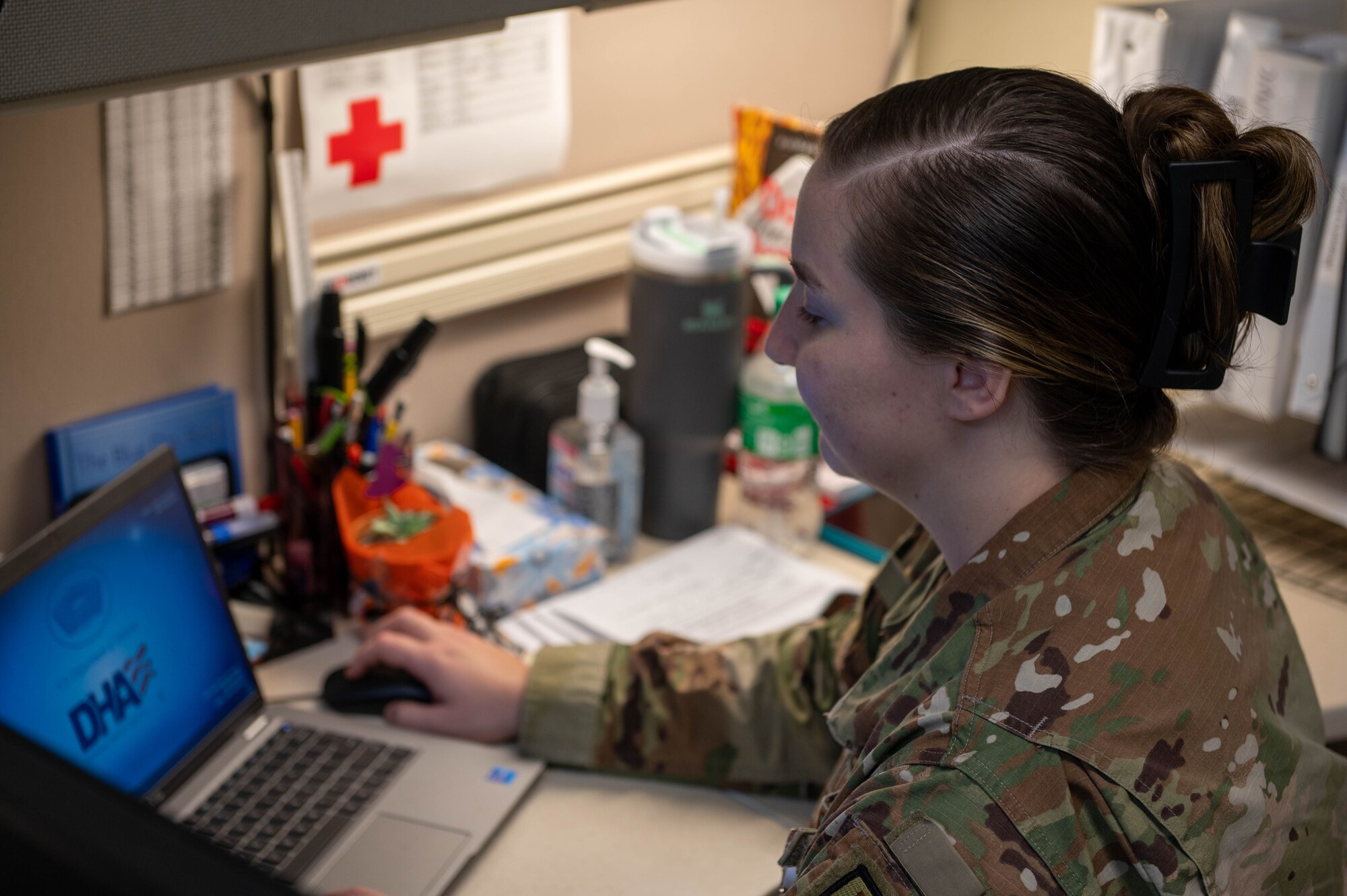 U.S. Air Force Staff Sgt. Alexa Barta, 36th Medical Group Warrior Medicine Clinic non-commissioned officer, is preparing for the launch of the Military Health System Genesis at Andersen Air Force Base, Guam, Jan. 12, 2024. MHS Genesis is an advanced electronic health record, that has replaced several legacy systems. (U.S. Air Force photo by Airman 1st Class Allon Lapaix)