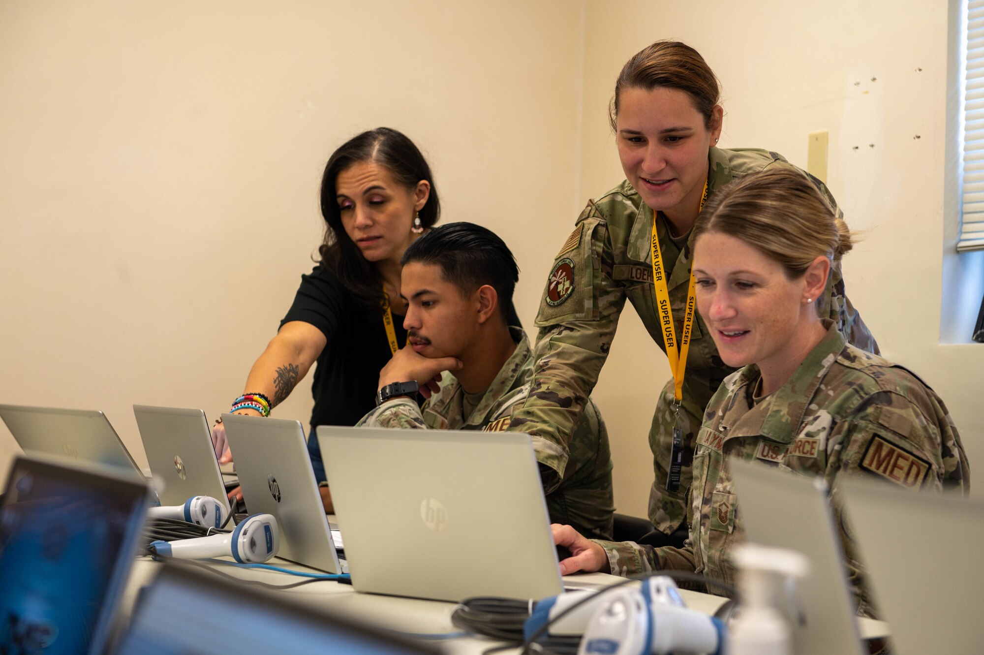 U.S. Air Force personnel assigned to the 36th Medical Group learn to use the Military Health System Genesis program at Andersen Air Force Base, Guam, Jan. 12, 2024. MHS Genesis is an advanced electronic health record, that has replaced several legacy systems. (U.S. Air Force photo by Airman 1st Class Allon Lapaix)