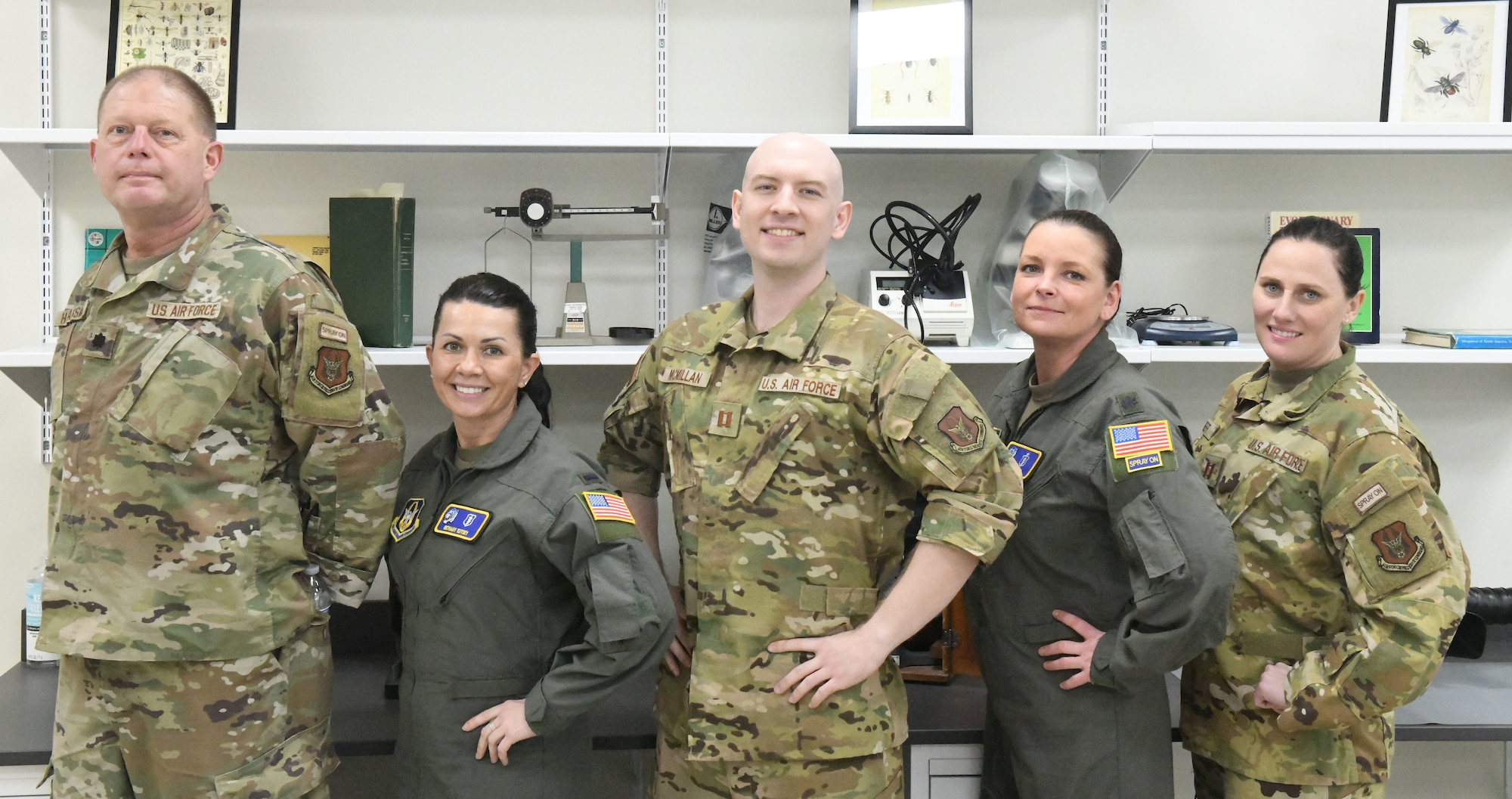 From left to right, Lt. Col. Karl Haagsma, 1st Lt. Bethany Eutsey, Capt. Benjamin McMillan, Lt. Col. Jennifer Remmers and Capt. Deanna Scheff, medical entomologists assigned to the 757th Airlift Squadron, celebrate a successful Department of Defense Aerial Spray Category 11 Applicator Course at Manatee County Mosquito Control District’s Headquarters, Florida, from Jan. 8-11, 2024.