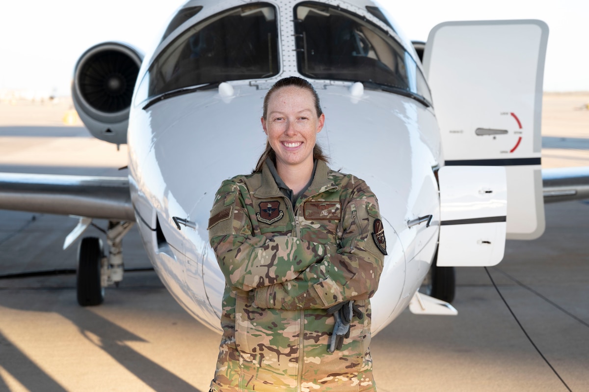 U.S. Air Force Capt. Tabitha Letourneau, 86th Flying Training Squadron instructor pilot, poses in front of a T-1A Jayhawk at Laughlin Air Force Base, Texas, January 9, 2024. Letourneau worked with the Women’s Initiative Team to invoke changes on the Air Force’s medical waiver guide, allowing her and other female instructor pilots to fly with unrated student pilots in the Air Force. (U.S. Air Force photo by Senior Airman Kailee Reynolds)