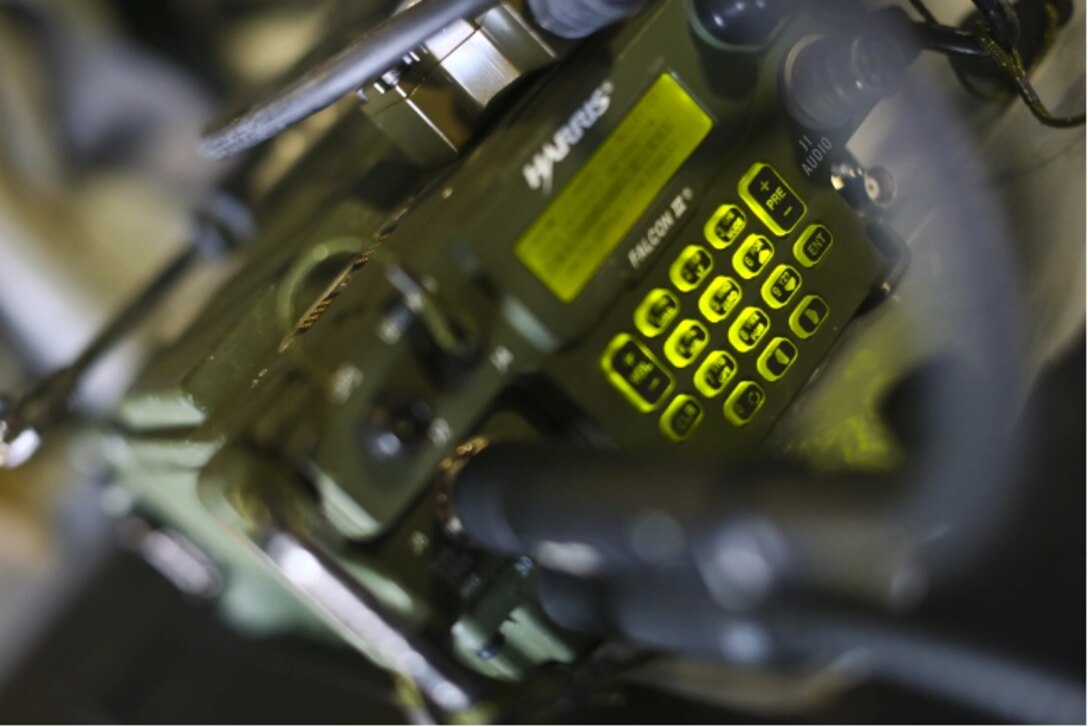 An AN/PRC-117G Adaptive Networking Wideband Waveform operates during a communications set up practical application on an MV-22 Osprey aboard Marine Corps Air Station Yuma, Ariz., on March 23, 2016. This practical application was apart of Weapons and Tactics Instructor Course (WTI 2-16), a seven week training event hosted by Marine Aviation Weapons and Tactics Squadron One (MAWTS-1) cadre. MAWTS-1 provides standardized advanced tactical training and certification of unit instructor qualifications to support Marine Aviation Training and Readiness and assists in developing and employing aviation weapons and tactics.