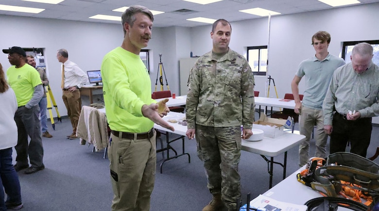 Richard Allen, U.S. Army Corps of Engineers, Mobile District Data Collection Unit technical lead, shows Col. Jeremy Chapman, Mobile District Commander, the various equipment the DCU team operates during an open house at the DCU in Irvington, Alabama, Jan. 10, 2024. Moving into the newly renovated building in September 2023, the DCU stands ready to be the District’s go-to source for rapid data collection processing. (U.S. Army photo by Chuck Walker)