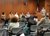 The Naval Surface Warfare Center, Philadelphia Division (NSWCPD) Women’s Employee Resource Group (WERG) Chair and Solid Waste and Hazardous Materials In-Service Engineering Branch Manager Allyson Jones-Zaroff (podium, left) and African American Employee Resource Group (AAERG) Secretary and Mechanical Engineer Taylor Barnett (podium, right) moderate the command’s Women’s Leadership Panel for a hybrid audience on Nov. 29, 2023. Panel members included (from left to right): Deputy Human Resource Director Keirston Graves; Comptroller Department Head Joyce Hall; Platforms Division Surface Ship Maintenance, Modernization and Sustainment (SEA21) Portfolio Manager Mia Korngruen; Propulsion, Power and Auxiliary Machinery Systems Department Head Karen Dunlevy-Miller; and Submarine Life Support R&D Lead Jay Smith. (U.S. Navy Photo by Phil Scaringi/Released)