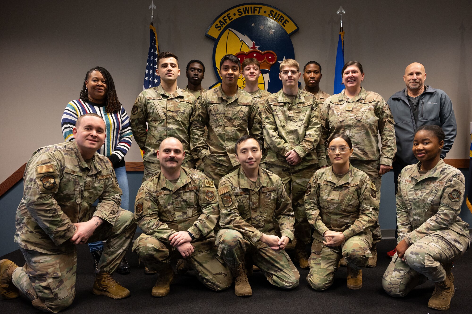 The 436th Operation Support Squadron’s 1C0X2 team poses for a group photo at Dover Air Force Base, Delaware, Jan. 18, 2024. The team recently won the Air Mobility Command Sgt. Dee Campbell Aviation Resource Management Large Unit Team of the Year Award. The team showcased direct operational support of the unit mission by initiating crews for the strategic airlift of two MQ-8C unmanned helicopters, facilitating the deployment of an airborne mine detection prototype across 50 partner nations during the second-largest naval exercise. The team also generated 732 flight authorizations, verified 15,000 flight and ground requirements, facilitated 473 combat sorties and 1,300 flight hours supporting Operation Spartan Shield, which transported over 32 million pounds of cargo and 1,200 passengers. (U.S. Air Force photo by Airman 1st Class Dieondiere Jefferies)