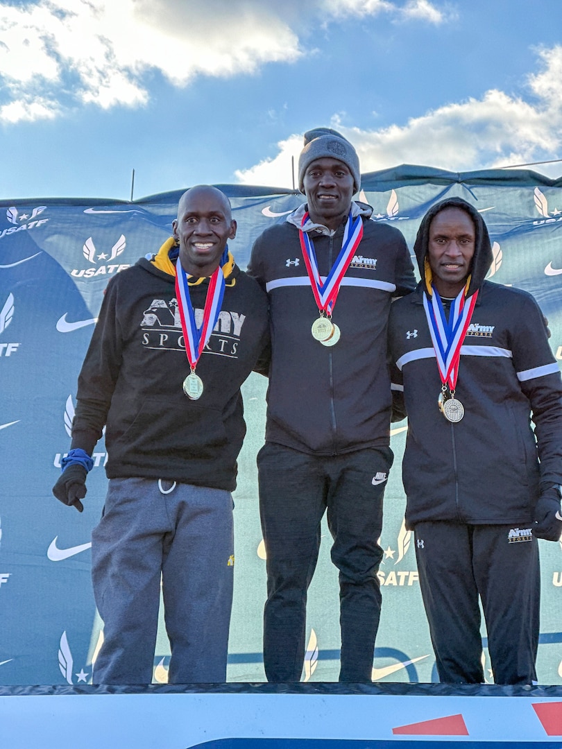 From left to right: Army 2nd lt. Emmanuel Bor, Sgt. Anthony Rotich, and Spc. Bernard Keter winning silver, gold, and bronze respectively during the 2024 Armed Forces Cross Country Championship held in conjunction with the USA Track and Field Cross Country National Championship in Richmond, Va.  The Armed Forces Championship features teams from the Army, Marine Corps, Navy (with Coast Guard runners), and Air Force (with Space Force Runners).  Department of Defense Photo by Mr. Steven Dinote - Released.
