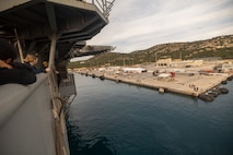 SOUDA BAY, CRETE (Jan. 20, 2024) Deck Department Sailors, assigned to Wasp-class amphibious assault ship USS Bataan (LHD 5) prepare for mooring as the ship pulls into Souda Bay, Crete, Jan. 20. Bataan is on a scheduled deployment in the U.S. Naval Forces Europe area of operations, employed by U.S. Sixth Fleet to defend U.S. allied and partner interests. (U.S. Navy photo by Mass Communication Specialist 2nd Class Christopher Jones)