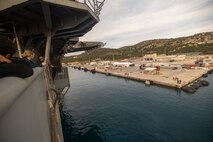 SOUDA BAY, CRETE (Jan. 20, 2024) Deck Department Sailors, assigned to Wasp-class amphibious assault ship USS Bataan (LHD 5) prepare for mooring as the ship pulls into Souda Bay, Crete, Jan. 20. Bataan is on a scheduled deployment in the U.S. Naval Forces Europe area of operations, employed by U.S. Sixth Fleet to defend U.S. allied and partner interests. (U.S. Navy photo by Mass Communication Specialist 2nd Class Christopher Jones)