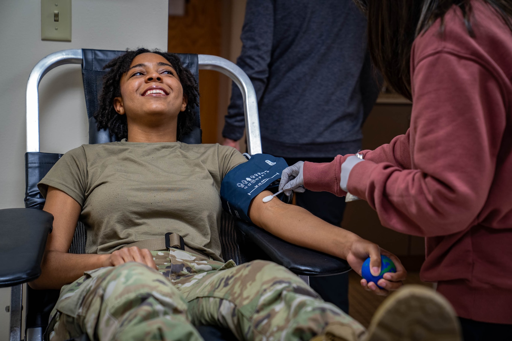 U.S. Air Force Airman 1st Class Devyn Waits, 81st Training Wing public affairs specialist, prepares to donate blood at the Triangle Clinic on Keesler Air Force Base, Mississippi, Jan. 18, 2024.