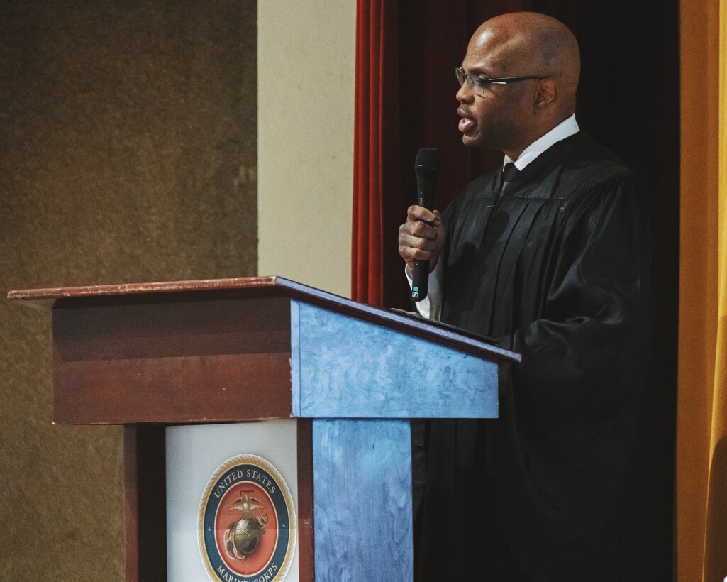 U.S. Navy Lt. Anthony Johnson, a native of Alabama with Marine Corps Air Station Futenma, gives remarks during a Dr. Martin Luther King Jr. celebration on MCAS Futenma, Okinawa, Japan, Jan. 17, 2023. During the celebration, Marines learned about Dr. King and the political movements of his time through videos and songs addressing racial injustice and the hope for a better future. After taking a pledge to promote equal opportunity, the Marines linked arms and sang together, showing their unity and commitment to equality. (U.S. Marine Corps photo by Cpl. Jonathan Beauchamp)