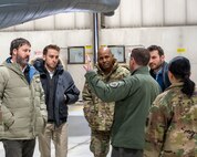 Col. Kenneth McGhee, 91st Missile commander, gives members of the Department of State a tour of training Launch Facility Uniform-01 at Minot Air Force Base, North Dakota, Jan. 18, 2024. During the tour, McGhee showed and explained the mechanics of the launcher closure door, and how it protects a Minute Man III while also having the ability to open swiftly. (U.S. Air Force photo by Senior Airman Evan Lichtenhan)