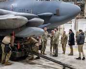 Col. Kenneth McGhee, 91st Missile commander, gives members of the Department of State a tour of training Launch Facility Uniform-01 at Minot Air Force Base, North Dakota, Jan. 18, 2024. During the tour, McGhee showed and explained the mechanics of the launcher closure door, and how it protects a Minute Man III while also having the ability to open swiftly. (U.S. Air Force photo by Senior Airman Evan Lichtenhan)