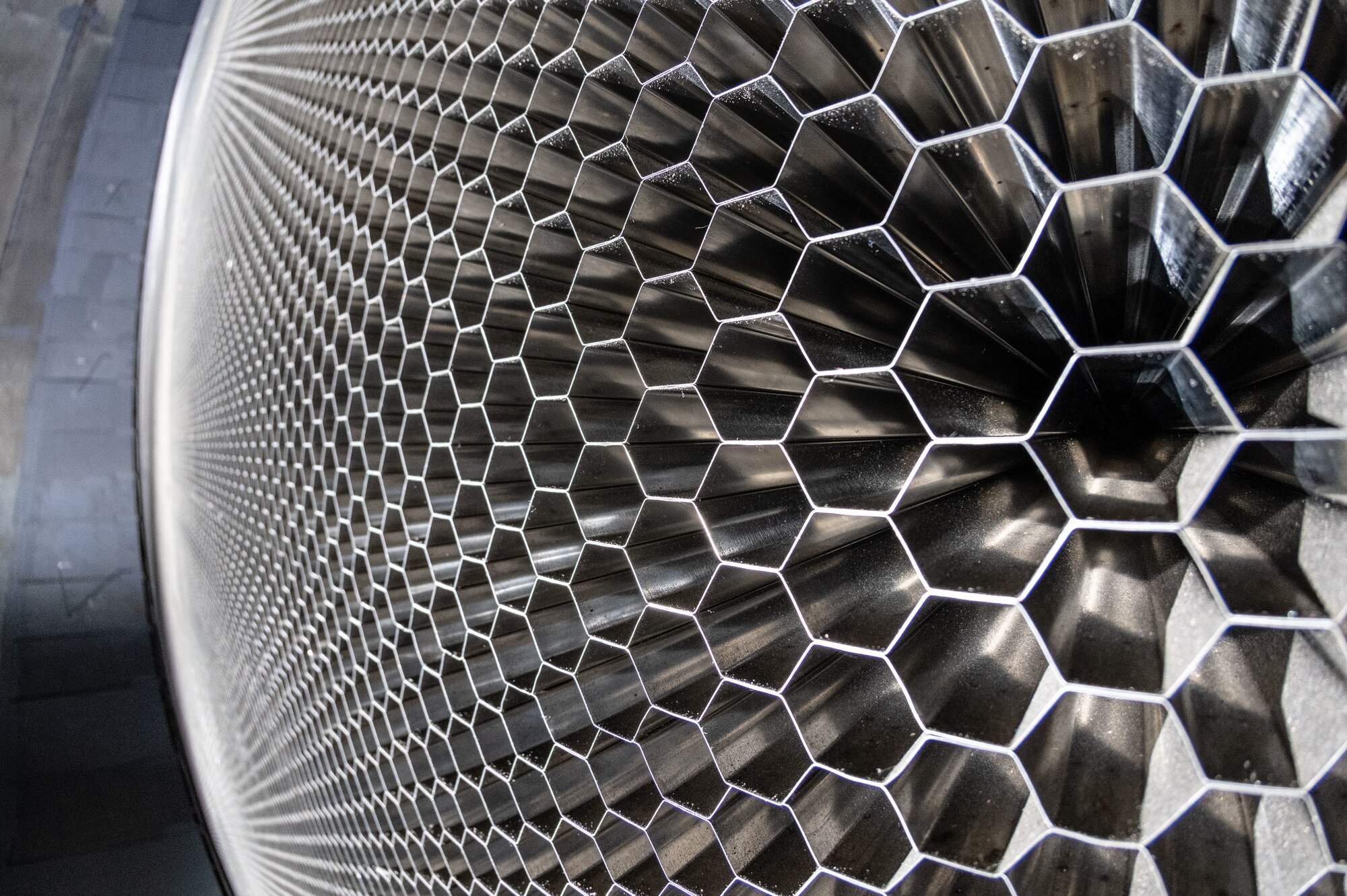 A closeup of the “honeycomb” structure in the 16-foot supersonic wind tunnel at Arnold Air Force Base, Tenn., is shown. The purpose of the honeycomb is to enhance wind tunnel flow quality. The installation process was completed in October 2023. The honeycomb is a single-piece structure that measures 55 feet in diameter, 4 feet thick and weighs more than 67 tons. It is made up of thousands of stainless steel 1-inch hexagonal honeycomb tubes. (U.S. Air Force photo by Keith Thornburgh)