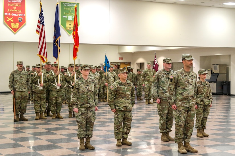 Pennsylvania Army National Guard Soldiers assigned to the 166th Regiment - Regional Training Institute stand in formation during the regiment's change of command ceremony at Fort Indiantown Gap, Annville, Pa. Jan 19, 2024.