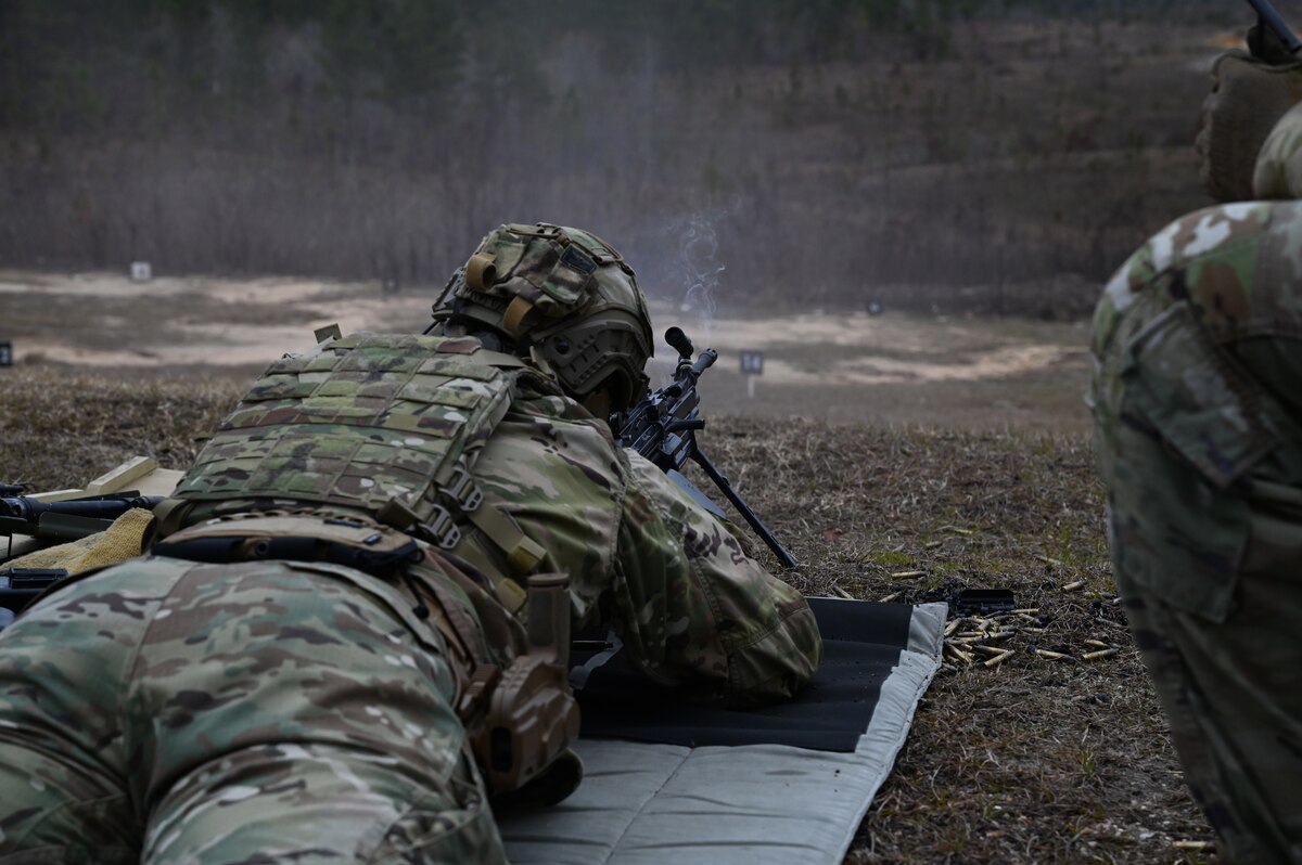 Air Force Reserve members fire heavy weapons.