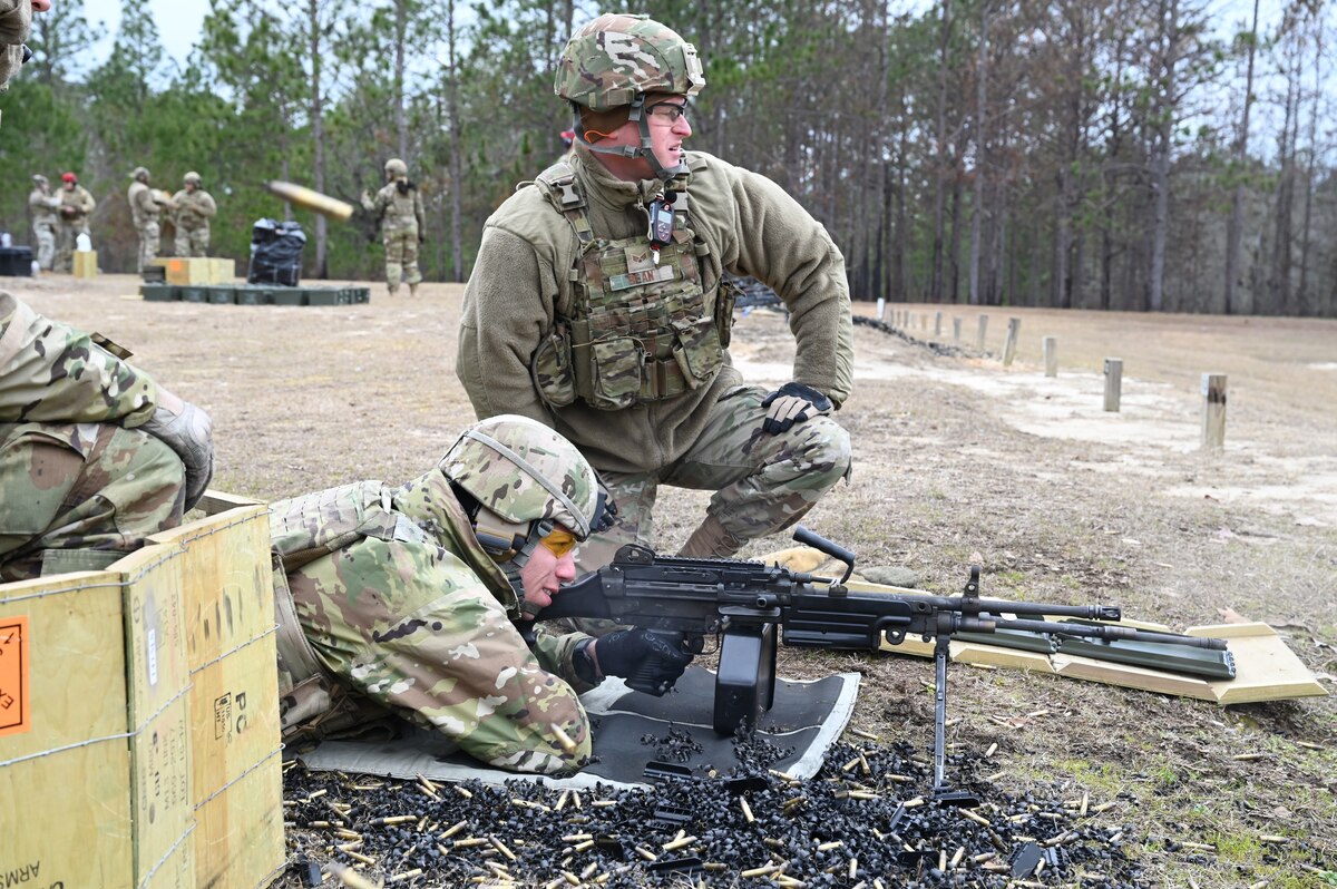 Air Force Reserve members fire heavy weapons.