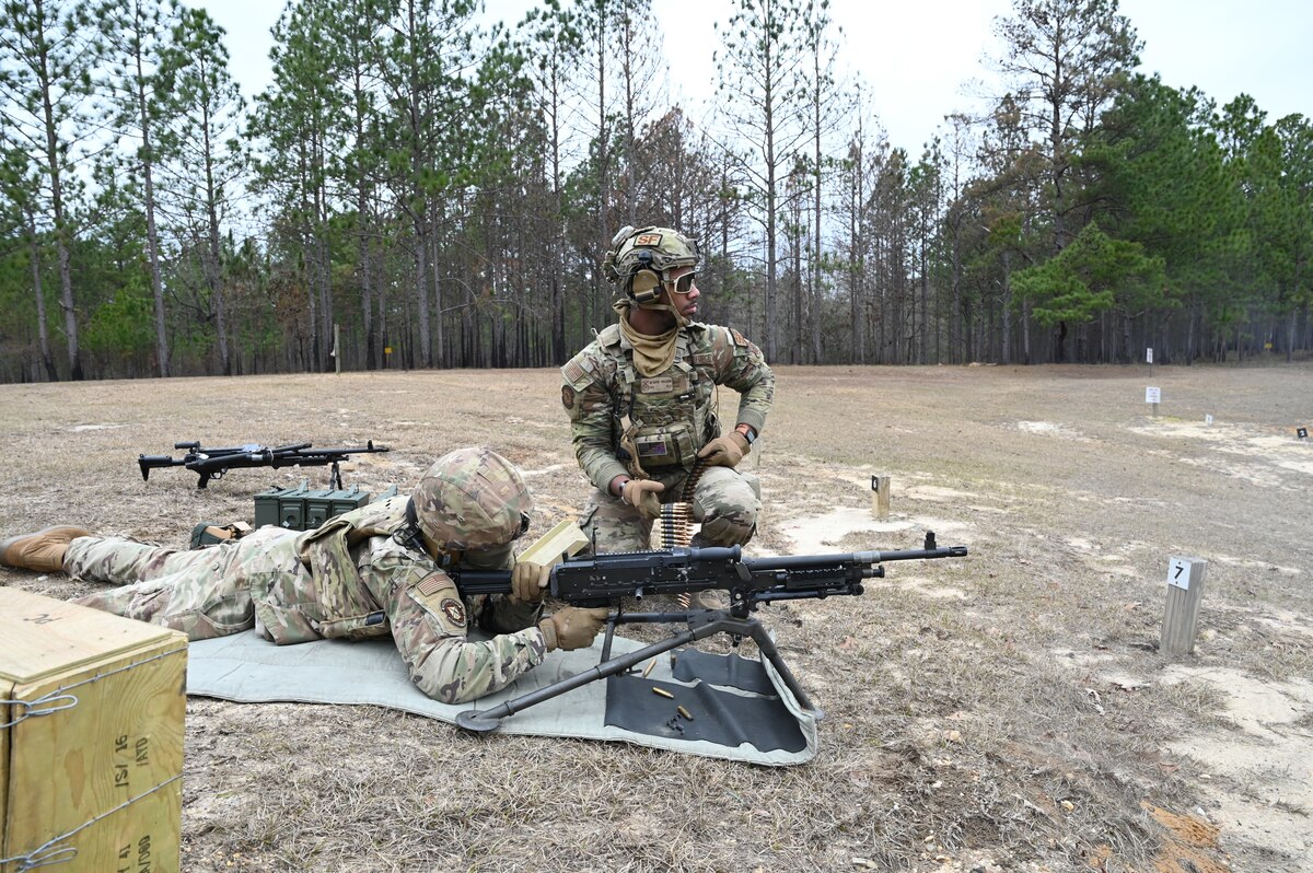 Air Force Reserve members fire heavy weapons.