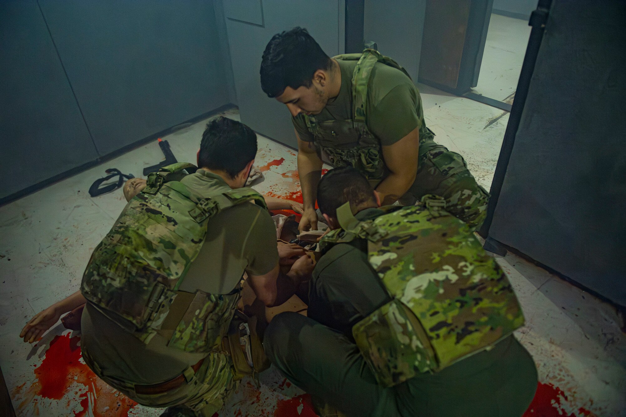 Airman works on simulated casualty.