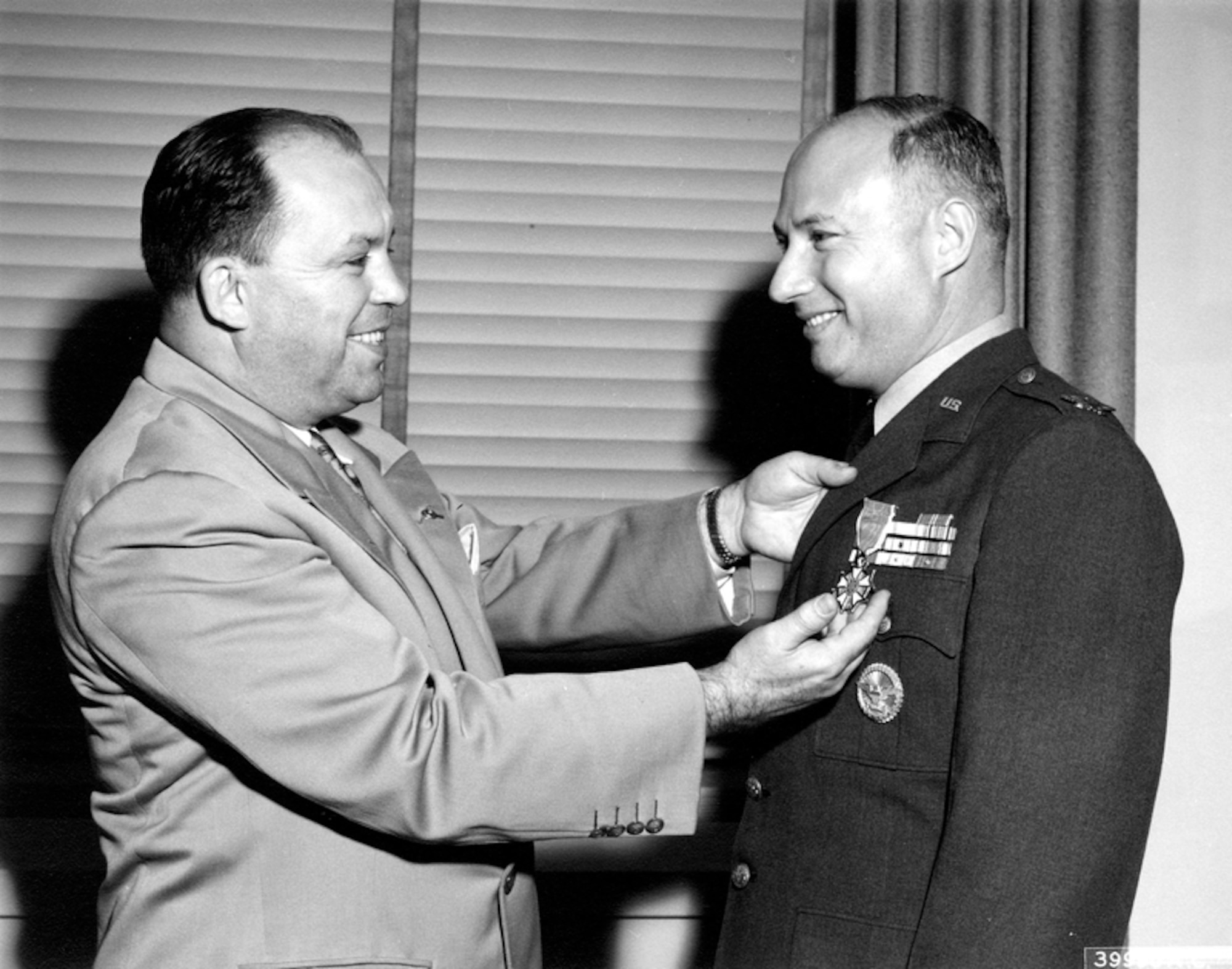 Colonel Sydney S. Rubenstein, Commandant of the OSI Training School, receiving the Legion of Merit on Oct. 20, 1950.