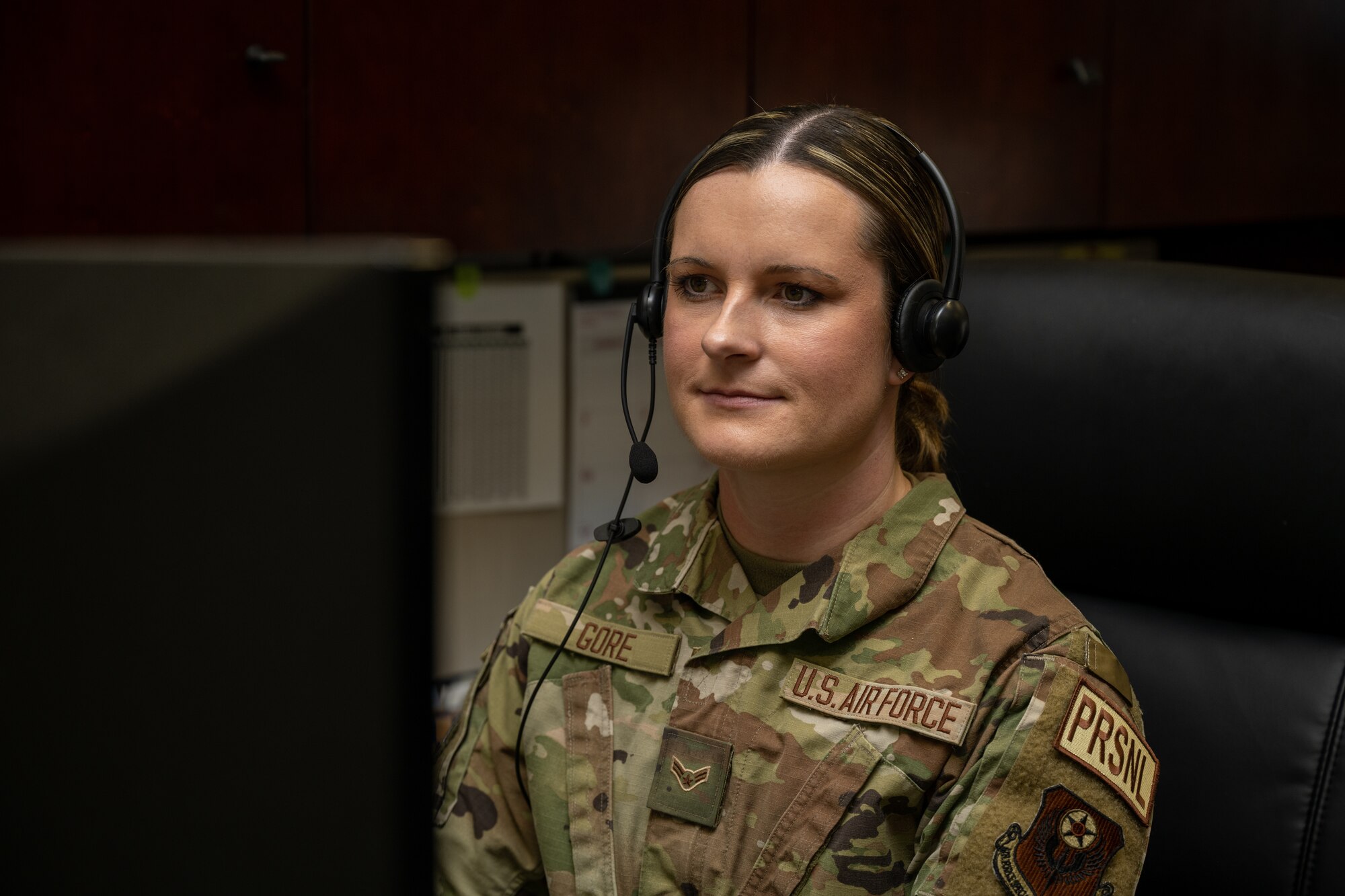 U.S. Air Force Airman 1st Class Sydney Gore, a 720th Operations Support Squadron command support staff technician, conducts administrative work at Hurlburt Field, Florida, Dec. 13, 2023. Daily responsibilities for Gore, include managing various tasks, such as the processing of paperwork related to in and out processing, duty information, evaluations, and numerous other military personnel operations. (U.S. Air Force photo by Senior Airman Calvarese)