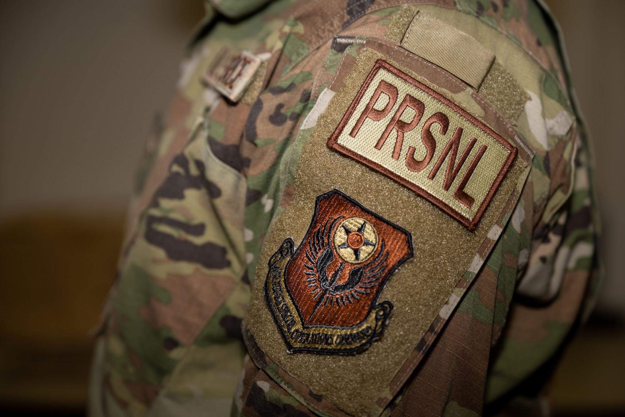 U.S. Air Force Airman 1st Class Sydney Gore, a 720th Operations Support Squadron command support staff technician, poses for a photo at Hurlburt Field, Florida, Dec. 13, 2023. The U.S. Air Force “PRSNL” patch refers to the personnel career field. (U.S. Air Force photo by Senior Airman Calvarese)
