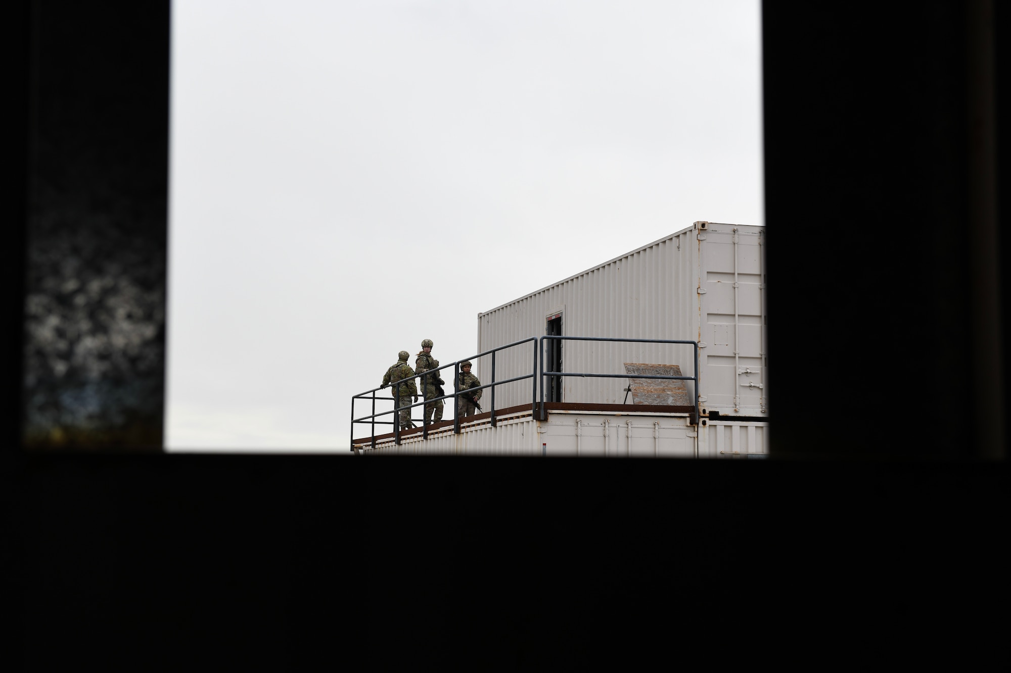 SFS Airmen search a building