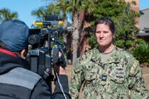 A photo of Capt. Nichole Nigro being interviewed.
