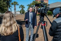 A photo of Peter Reddy being interviewed.