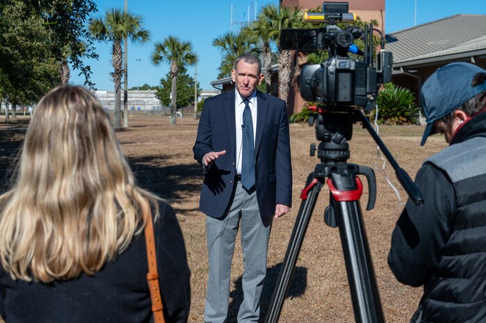 A photo of Peter Reddy being interviewed.