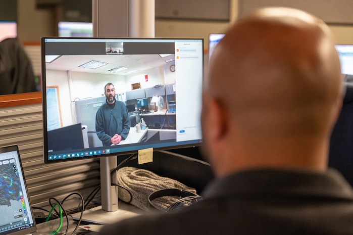 A photo of Mike Johnson on a computer screen.