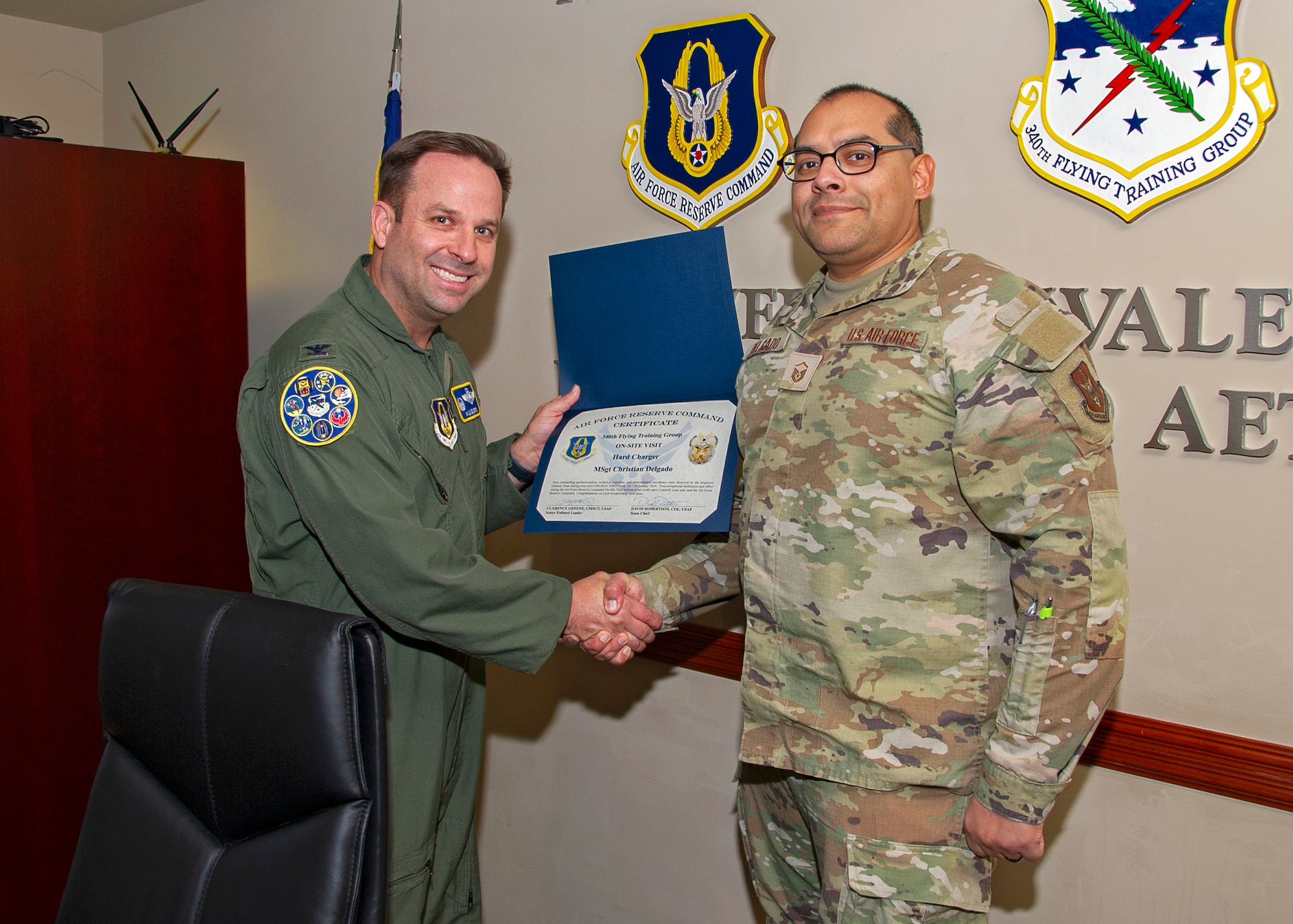 340th FTG commander presents a superior performer award