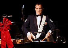 Technical Sergeant Ed Zaryky wows the crowd with his rope drum percussion skills for Sounds of the Season 2023!