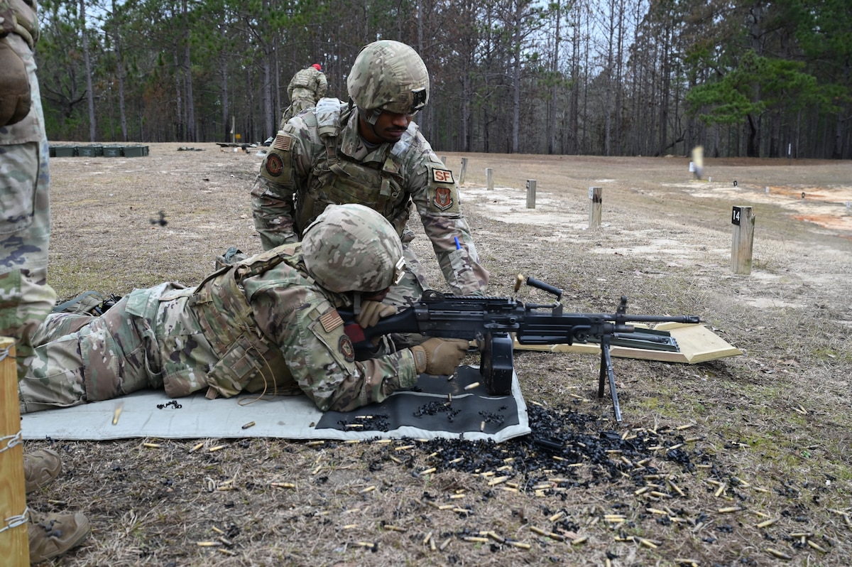Air Force Reserve members fire heavy weapons.