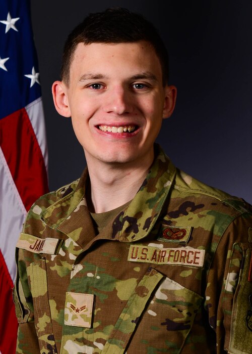 Airman 1st Class Jakel takes an official photo.