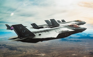 U.S. Air Force F-35A Lightning II’s assigned to the 61st Fighter Squadron and an F-16 Fighting Falcon aircraft assigned to the 309th Fighter Squadron, fly in formation, Jan. 19, 2024, over Luke AFB, Arizona.