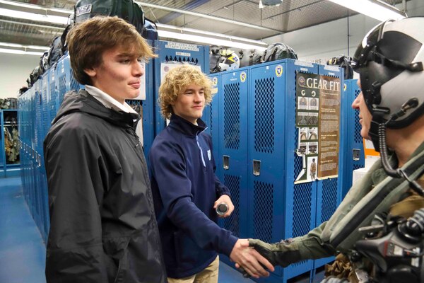 240122-N-MY408-1145 VIRGINIA BEACH, Va. (Jan. 22, 2024) Connor Robertson (left) and Chase Amos, two high school students from Advanced Technology Center’s Naval Architecture & Ocean Engineering course in Virginia Beach, cycle a M61A1 20-millimeter gatling gun while touring Strike Fighter Squadron (VFA) 106 “Gladiators” hangars and facilities at Naval Air Station Oceana. Robertson and Amos won the first-ever Naval Air Force Atlantic (AIRLANT) essay contest where they were provided an opportunity to join AIRLANT’s Force Master Chief Jimmy W. Hailey III for the day to learn more about naval aviation (U.S. Navy photo by Lt. j.g. Daniel Ehrlich)