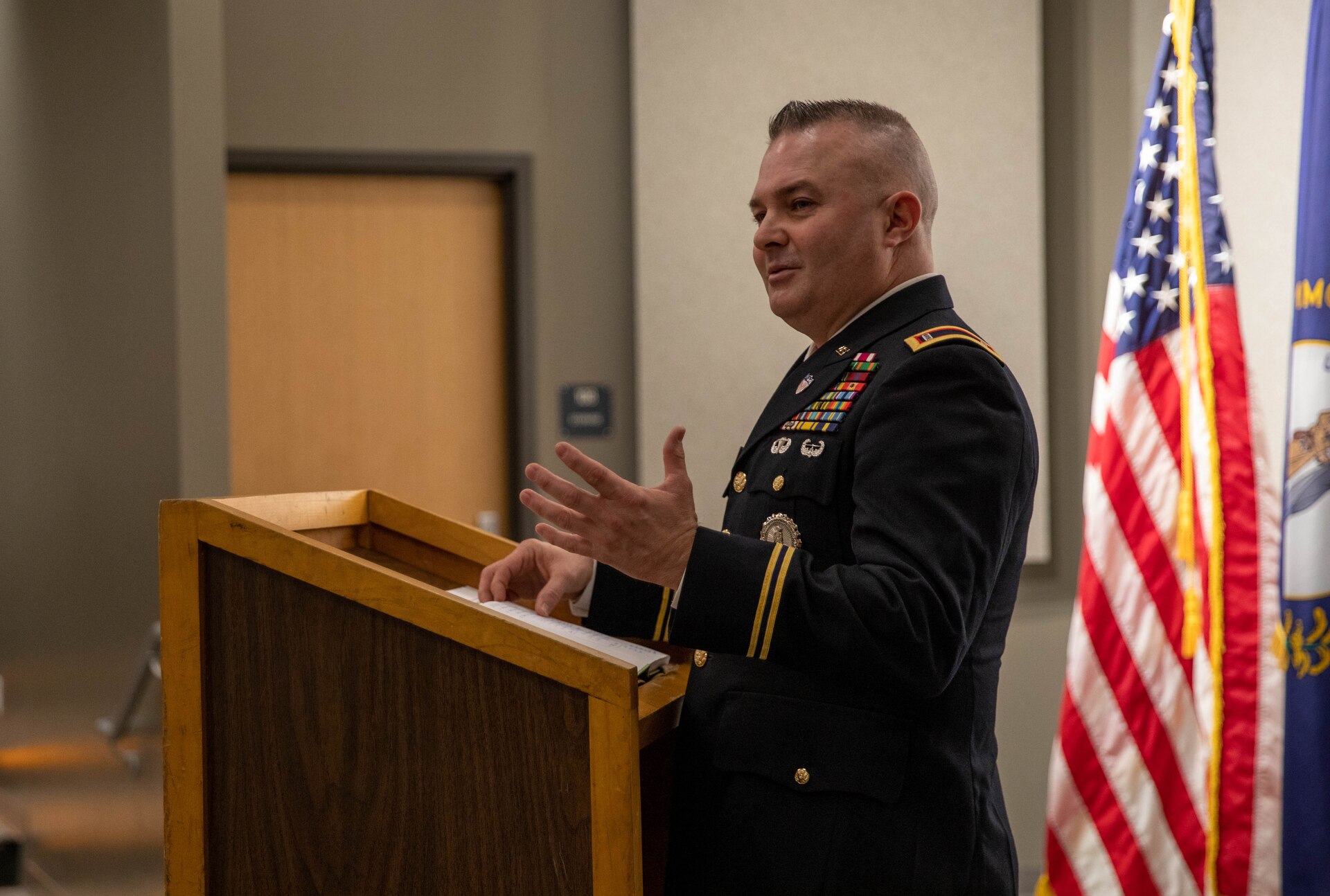 Chief Warrant Officer Four Timothy Collins addresses the audience to thank them for their time and support during his promotion ceremony at the Wellman Auditorium on Boone Center in Frankfort, Kentucky, Jan. 22, 2024