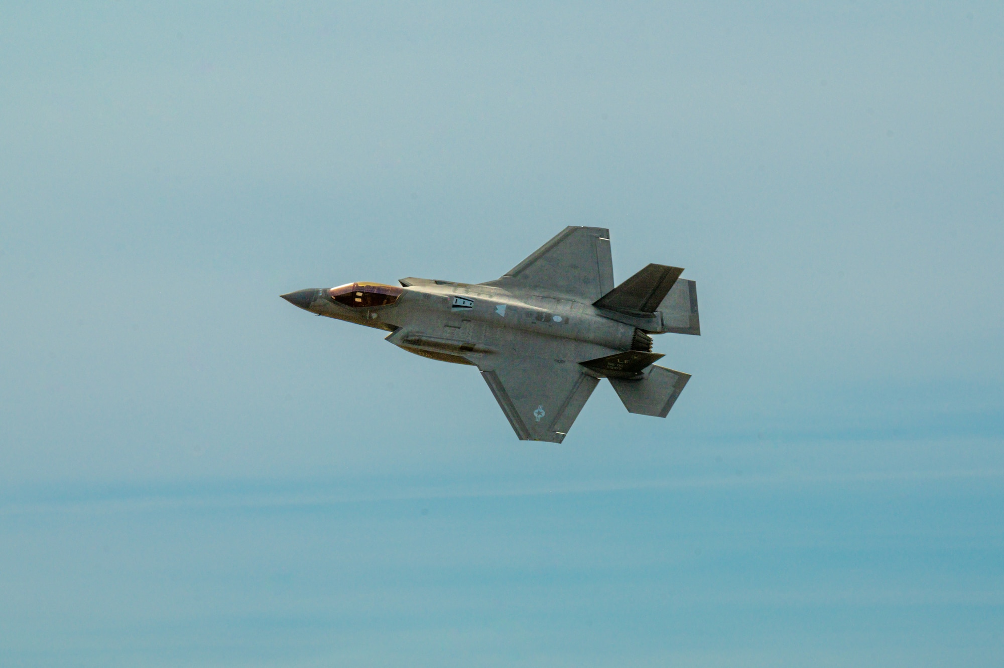 An F-35 Lightning II assigned to the 56th Fighter Wing flies over Barry M. Goldwater Range, Arizona, Jan. 19, 2024.