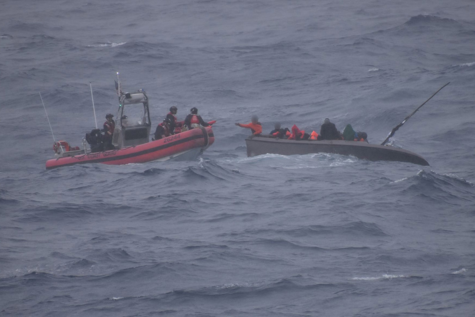 U.S. Coast Guard Cutter Dependable's crew rescues 33 people from a vessel taking on water near Cap-Haitien, Haiti, Jan. 22, 2024. The people were transferred to Haitian authorities on Jan. 23, 2024. (U.S. Coast Guard photo)