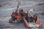 U.S. Coast Guard Cutter Dependable's crew rescues 33 people from a vessel taking on water near Cap-Haitien, Haiti, Jan. 22, 2024. The people were transferred to Haitian authorities on Jan. 23, 2024. (U.S. Coast Guard photo)