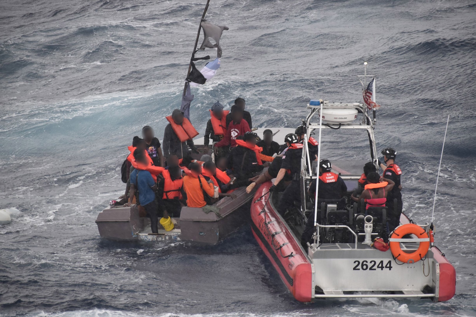 U.S. Coast Guard Cutter Dependable's crew rescues 33 people from a vessel taking on water near Cap-Haitien, Haiti, Jan. 22, 2024. The people were transferred to Haitian authorities on Jan. 23, 2024. (U.S. Coast Guard photo)