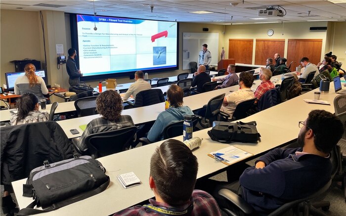 Employees of Naval Undersea Warfare Center Division, Keyport participate in a Technical Talk recently held at the command as part of a partnership between its Undersea Weapons Department and the Naval Postgraduate School.