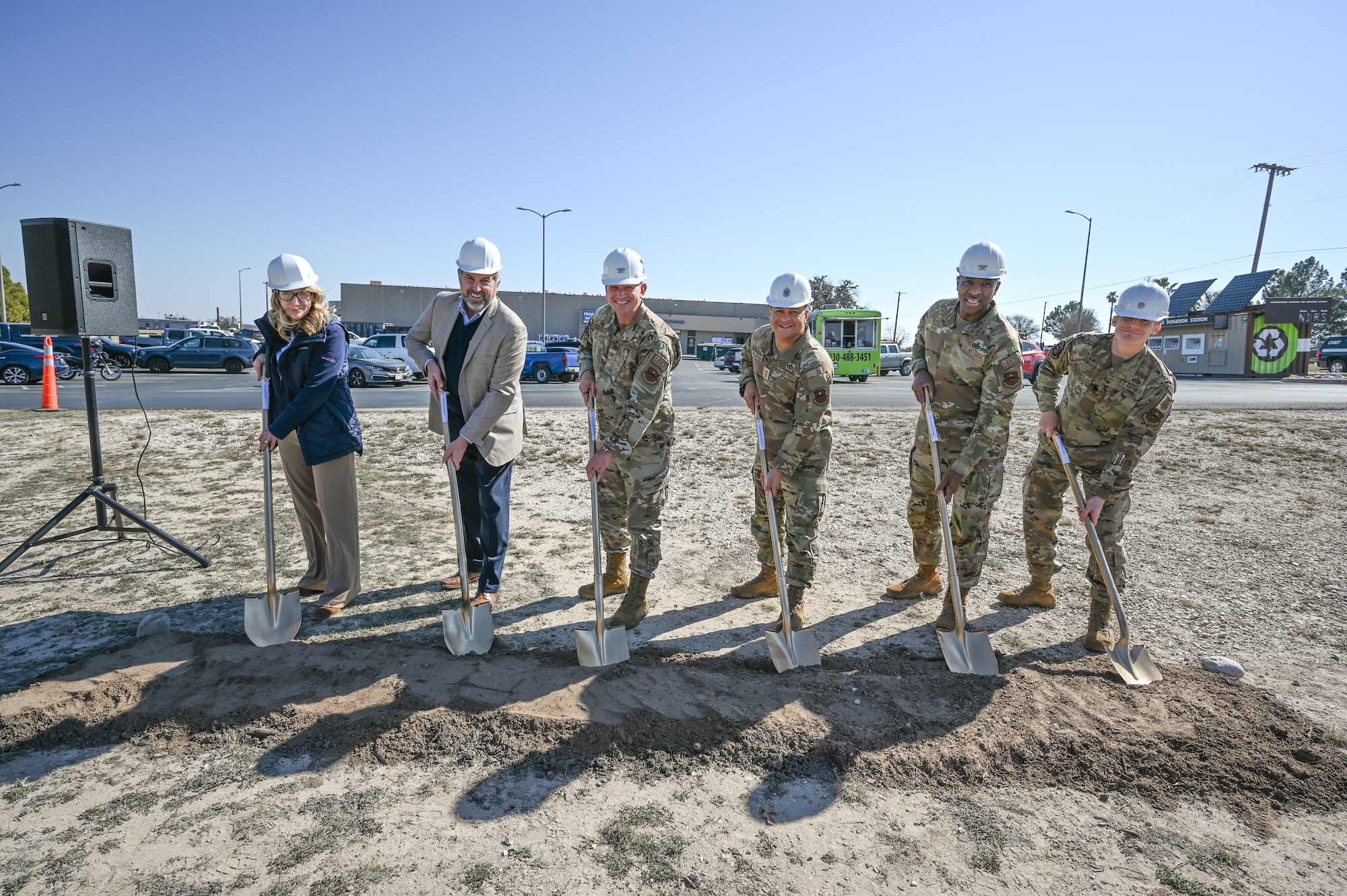 Leadership and key personnel turned the first shovels of dirt, symbolically commencing the project.